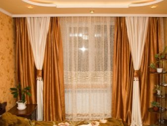 Штори в зал на стельовий карниз (40 фото): як вибрати штори для кутових карнизів у вітальню? Які бувають карнизи для штор? Приклади інтер’єру shtori v zal na stel oviy karniz 40 foto yak vibrati shtori dlya kutovih karniz v u v tal nyu yak buvayut karnizi dlya shtor prikladi nter ru 33 - Штори в зал на стельовий карниз (40 фото): як вибрати штори для кутових карнизів у вітальню? Які бувають карнизи для штор? Приклади інтер’єру